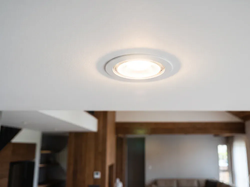 Recessed LED light glowing in a clean ceiling